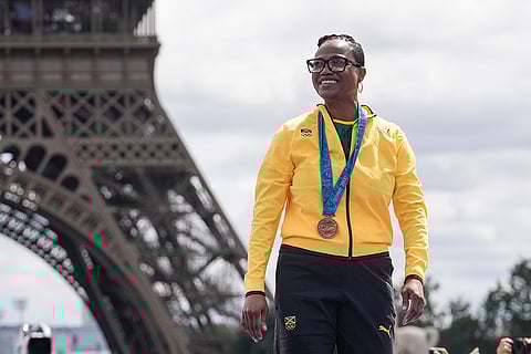 2000 Syndey Olympics women's 200-meter race: Beverly McDonald of Jamaica smiles after receiving her bronze medal